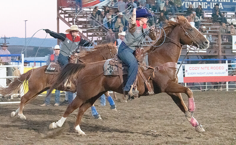 The team roping duo of Henry Cox (behind) and Milee Dolan compete during the Trapper rodeo on Sept. 5. The Trappers head into the winter needing to find answers after not scoring at the final two rodeos of the fall.