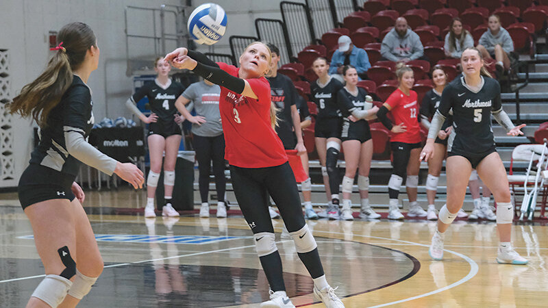 Shilah Arnold stretches out to pass a ball during the Trappers' game against Gillette College. Northwest hosts its final regular season game on Friday against Western Wyoming.